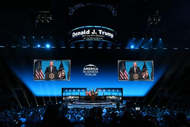 US President Donald Trump speaks at the American Business Forum at the Kaseya Center in Miami on November 5, 2025. (Photo by CHANDAN KHANNA / AFP)
