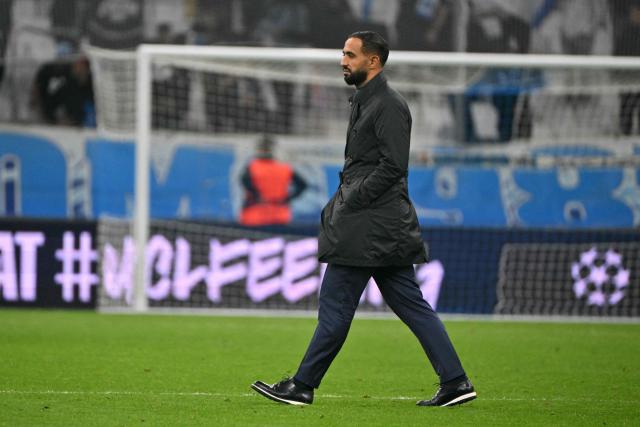 Olympique de Marseille's French-Moroccan sporting director Medhi Benatia walks on the pitch at the end of the UEFA Champions League, league phase day 4, football match between Olympique de Marseille (OM) and Atalanta Bergame at the Velodrome stadium, in Marseille on November 5, 2025. (Photo by Christophe Simon / AFP)