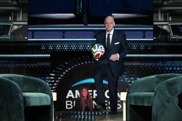 FIFA President Gianni Infantino goes up on the stage to speak at the American Business Forum at the Kaseya Center in Miami on November 5, 2025. (Photo by Chandan Khanna / AFP)
