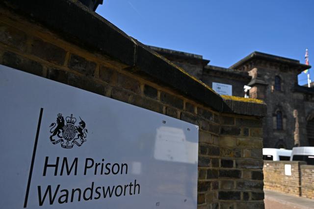 (FILES) The stone walls of HM Prison Wandsworth are seen in the late summer sunshine in south London on September 7, 2023. British police said on November 5, 2025, they had launched a manhunt for two prisoners, including an Algerian, mistakenly released from Wandsworth jail, angering parliamentarians at the latest mix-up committed by the UK's beleaguered prison system.  London's Metropolitan Police force said in a statement it was looking for 24-year-old Brahim Kaddour Cherif, a registered sex offender, after he was released in error a week ago. Separately, police in Surrey, southwest of  London, said that Wandsworth prison had on Monday mistakenly released another man convicted of multiple fraud offences. (Photo by JUSTIN TALLIS / AFP)