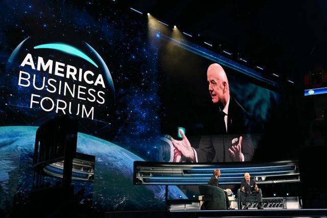 FIFA President Gianni Infantino (R) speaks at the American Business Forum at the Kaseya Center in Miami on November 5, 2025. (Photo by CHANDAN KHANNA / AFP)
