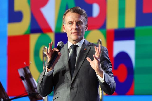 France's President Emmanuel Macron speaks during the opening of the Festival "Our Future – Brazil-France, dialogues with Africa" in Salvador, Bahia state, Brazil, on November 5, 2025. (Photo by Ludovic MARIN / AFP)