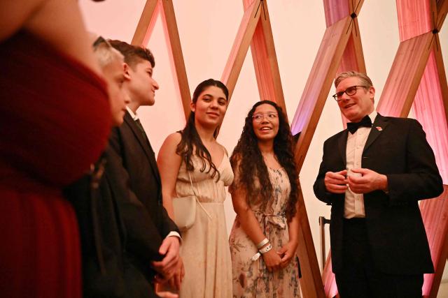Britain's Prime Minister Keir Starmer talks with the finalists during a meeting ahead of the Earthshot Prize 2025 awards ceremony at the Museum of Tomorrow in Rio de Janeiro, Brazil on November 5, 2025. (Photo by Ben STANSALL / POOL / AFP)