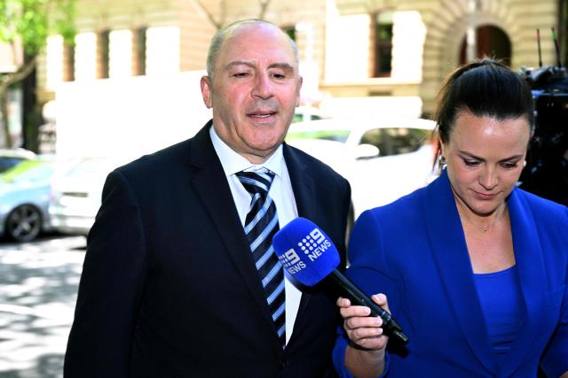 Tony Mokbel, one of the key figures in Melbourne's years-long gangland war, walks from the Victoria Supreme Court of Appeal in Melbourne on November 6, 2025. Mokbel has avoided any more jail time over a decades-old drug trafficking charge, a court ruled Thursday. (Photo by William WEST / AFP)