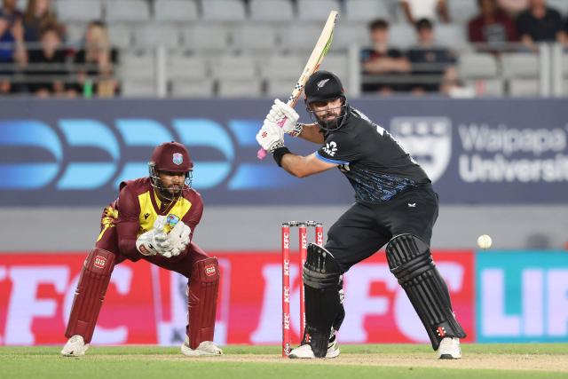 New Zealand’s Daryl Mitchell bats during the second Twenty20 international cricket match between New Zealand and West Indies played at Eden Park in Auckland on November 6, 2025. (Photo by Michael Bradley / AFP)