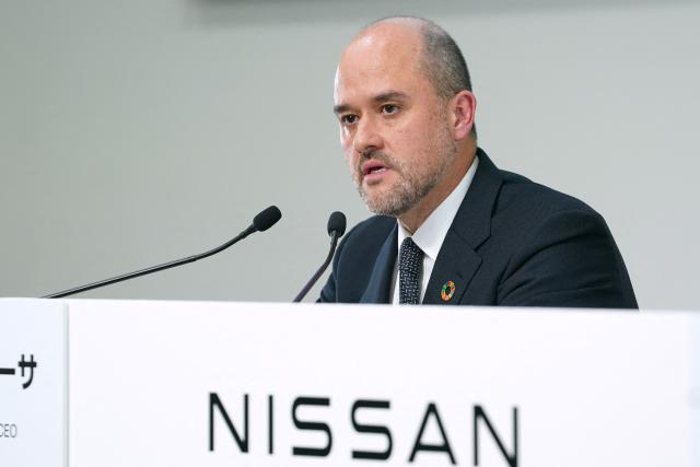Nissan Motor Presidnet and CEO Ivan Espinosa speaks during a press conference to announce financial results at the compnay's global headquarters in Yokohama on November 6, 2025. (Photo by Kazuhiro NOGI / AFP)