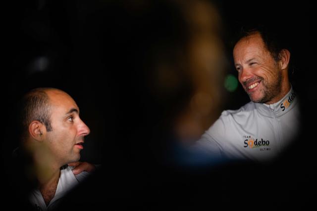 "Sodebo" ULTIM class multihull French skippers Thomas Coville (R) and Benjamin Schwartz celebrate after arriving second in the 17th edition of the Transat Cafe L'Or, off the shores of Fort-de-France, in the French overseas island of Martinique on November 6, 2025. Four open classes will take part in the race: IMOCA, Ocean Fifty, ULTIM and Class40. The Transat Cafe L'Or is a duo sailing race from Le Havre to Fort-de-France, in the French Caribbean island of Martinique. (Photo by Loic VENANCE / AFP)