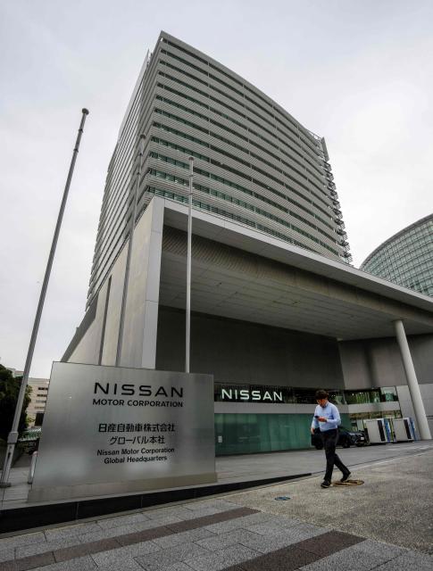 Nissan Motor Corporation Global Headquarters building is seen in Yokohama on November 6, 2025. Struggling Japanese automaker Nissan said on November 6 it was on the "path to recovery" even as it reported a hefty $690-million loss for the second quarter. (Photo by Kazuhiro NOGI / AFP)
