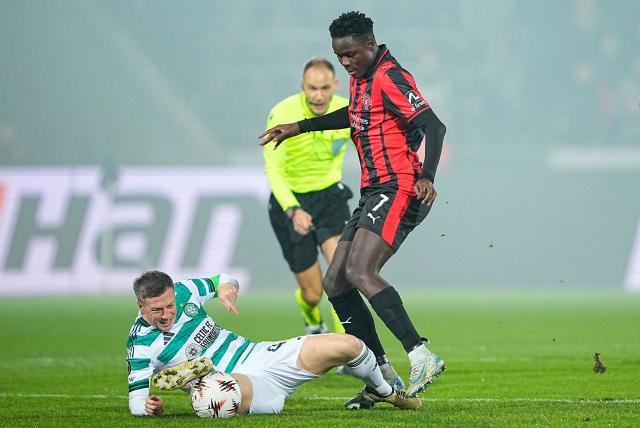 Midtjylland's Bissau-Guinean forward #07 Dju Franculino and Scottish midfielder #42 Callum McGregor vie for the ball during the UEFA Europa League football match between FC Midtjylland and Celtic FC in Herning, Denmark on November 6, 2025. (Photo by Bo Amstrup / Ritzau Scanpix / AFP) / Denmark OUT