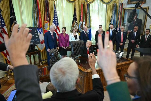 US President Donald Trump takes questions from reporters during an event about weight-loss drugs in the Oval Office of the White House in Washington, DC on November 6, 2025. President Trump announced deals Thursday with pharmaceutical giants Eli Lilly and Novo Nordisk to lower the prices of some popular weight-loss drugs. Both companies "have agreed to offer their most popular GLP-1 weight-loss drug," Trump said, "at drastic discounts." (Photo by ANDREW CABALLERO-REYNOLDS / AFP)