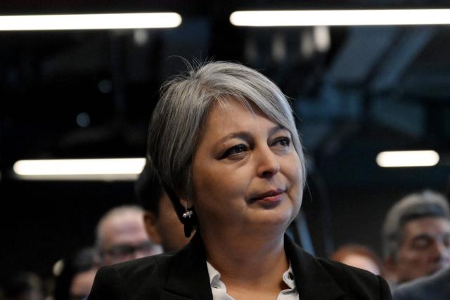 Chile's presidential candidate Jeannette Jara (L), of the Unidad por Chile coalition, looks on during a meeting with Cooperatives of Chile, a national association founded in 2018 that represents and advocates for cooperative organizations across the country, in Santiago, on November 6, 2025. Chile will hold the presidential election on November 16. (Photo by RODRIGO ARANGUA / AFP)