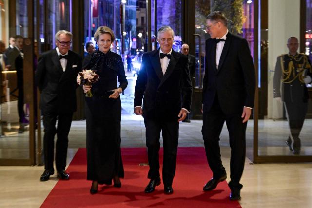 Queen Mathilde of Belgium (C-L) and King Philippe - Filip of Belgium arrive for the gala evening organized by the Antwerp Support Committee for the King Baudouin Foundation, which is celebrating its 25th anniversary, in Antwerp, on November 6, 2025. (Photo by DIRK WAEM / Belga / AFP) / Belgium OUT
