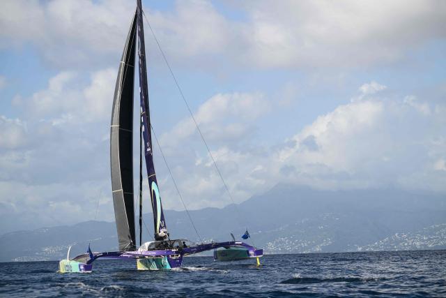 "Viabilis Oceans" Ocean Fifty multihull French skippers Baptiste Hulin and Thomas Rouxel sail to win the Ocean Fifty class 17th edition of the Transat Cafe L'Or, off the shores of Fort-de-France, in the French overseas island of Martinique on November 6, 2025. Four open classes take part in the race: IMOCA, Ocean Fifty, ULTIM and Class40. The Transat Cafe L'Or is a duo sailing race from Le Havre to Fort-de-France, in the French Caribbean island of Martinique. (Photo by Loic VENANCE / AFP)