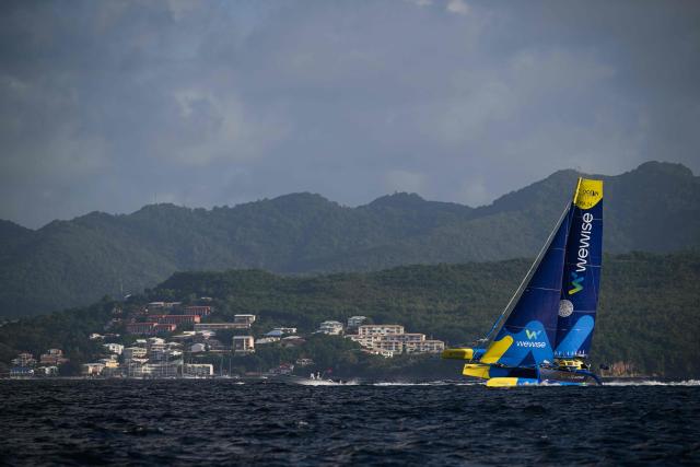 "Wewise" Ocean Fifty multihull French skippers Pierre Quiroga and Gaston Morvan sail to place second in the Ocean Fifty class 17th edition of the Transat Cafe L'Or, off the shores of Fort-de-France, in the French overseas island of Martinique on November 6, 2025. Four open classes take part in the race: IMOCA, Ocean Fifty, ULTIM and Class40. The Transat Cafe L'Or is a duo sailing race from Le Havre to Fort-de-France, in the French Caribbean island of Martinique. (Photo by Loic VENANCE / AFP)