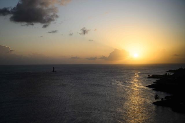"Actual" Ultim multihull French skippers Julien Villion and Anthony Marchand sail to place third in the Ultim class of 17th edition of the Transat Cafe L'Or, off the shores of Fort-de-France, in the French overseas island of Martinique on November 6, 2025. Four open classes take part in the race: IMOCA, Ocean Fifty, ULTIM and Class40. The Transat Cafe L'Or is a duo sailing race from Le Havre to Fort-de-France, in the French Caribbean island of Martinique. (Photo by Loic VENANCE / AFP)