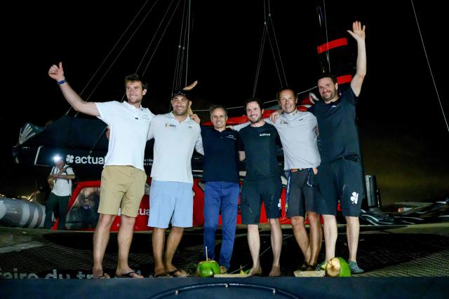 French skippers, SVR-Lazartigue's Tom Laperche (L) and Franck Cammas, first, Sodebo's Benjamin Schwartz (2ndL) and Thomas Coville (2ndR), second, and Actual's Julien Villion (3dR) and Anthony Marchand (R), third, the podium of the Ultim class of 17th edition of the Transat Cafe L'Or, pose in Fort-de-France, in the French overseas island of Martinique on November 6, 2025. Four open classes take part in the race: IMOCA, Ocean Fifty, ULTIM and Class40. The Transat Cafe L'Or is a duo sailing race from Le Havre to Fort-de-France, in the French Caribbean island of Martinique. (Photo by Loic VENANCE / AFP)