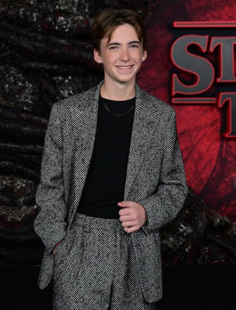 US actor Carson Minniear attends the world premiere of Netflix's "Stranger Things", Season 5, at the TCL Chinese theatre in Los Angeles on November 6, 2025. (Photo by Frederic J. BROWN / AFP)