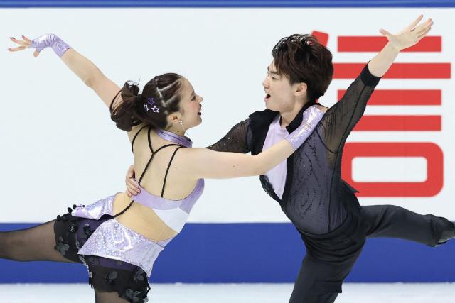 Japan's Utana Yoshida (L) and Masaya Morita perform in the Ice Dance Rhythm Dance at the NHKIce Rhythm Dance at the ISU Grand Prix of Figure Skating 2025/26 NHK Trophy in Kadoma City, Osaka Prefecture on November 7, 2025. (Photo by JIJI Press / AFP) / Japan OUT