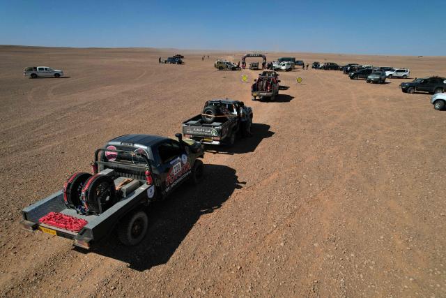 Competitors gather for second stage of the 2025 4x4 Tete Desert Rally in Waddan, some 550km southeast of the Libyan capital Tripoli, on November 6, 2025. The race includes motorcycles, quad-bikes and four-wheel drive vehicles. (Photo by Mahmud TURKIA / AFP)