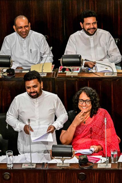 Sri Lanka's President Anura Kumara Dissanayake (front L) presents the 2026 budget to parliament as Prime Minister Harini Amarasuriya (front R) watches in Colombo on November 7, 2025. (Photo by Ishara S. KODIKARA / AFP)