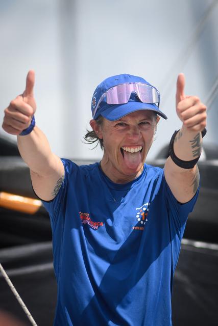 11th Hour Racing Imoca monohull skipper Italian Francesca Clapcich celebrates after finishing second in the Imoca class 17th edition of the Transat Cafe L'Or, off shores Fort-de-France, in the French overseas island of Martinique on November 7, 2025. Four open classes take part in the race: IMOCA, Ocean Fifty, ULTIM and Class40. The Transat Cafe L'Or is a duo sailing race from Le Havre to Fort-de-France, in the French Caribbean island of Martinique. (Photo by Loic VENANCE / AFP)