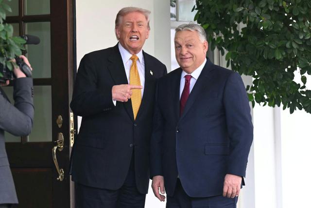 US President Donald Trump gestures as he greets Hungarian Prime Minister Viktor Orban outside the West Wing of the White House in Washington, DC on November 7, 2025. (Photo by SAUL LOEB / AFP)