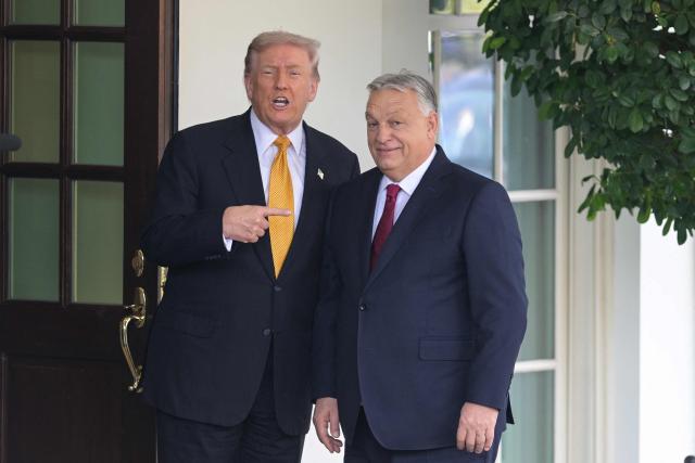 (L/R) US President Donald Trump greets Hungarian Prime Minister Viktor Orban outside the West Wing of the White House in Washington, DC on November 7, 2025. (Photo by Oliver Contreras / AFP)