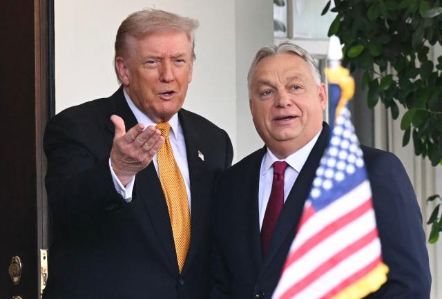 (L/R) US President Donald Trump greets Hungarian Prime Minister Viktor Orban outside the West Wing of the White House in Washington, DC on November 7, 2025. (Photo by SAUL LOEB / AFP)