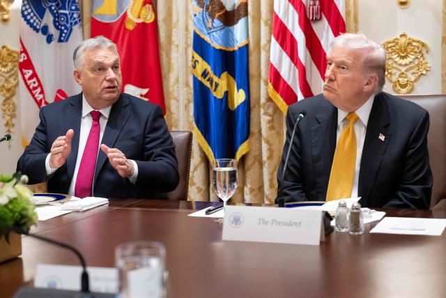 Hungarian Prime Minister Viktor Orban (L) speaks during a meeting with US President Donald Trump in the Cabinet Room of the White House in Washington, DC on November 7, 2025. (Photo by SAUL LOEB / AFP)