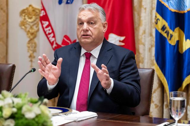 Hungarian Prime Minister Viktor Orban speaks during a meeting with US President Donald Trump in the Cabinet Room of the White House in Washington, DC on November 7, 2025. (Photo by SAUL LOEB / AFP)