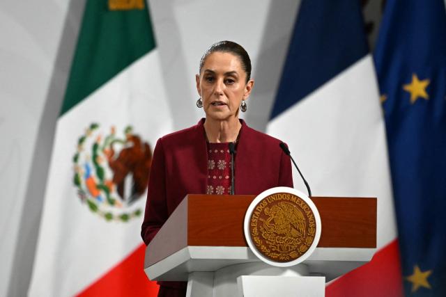 Mexico's President Claudia Sheinbaum speaks next to France's President Emmanuel Macron  (out of frame) during a joint press conference at the National Palace in Mexico City on November 7, 2025. (Photo by CARL DE SOUZA / AFP)