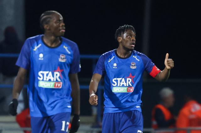 Dender's Angolan forward Bruny Nsimba celebrates after scoring his team first goal during Belgian Jupiler Pro League football match between FCV Dender EH and Zulte Waregem, in Denderleeuw, on November 7, 2025. (Photo by VIRGINIE LEFOUR / Belga / AFP) / Belgium OUT