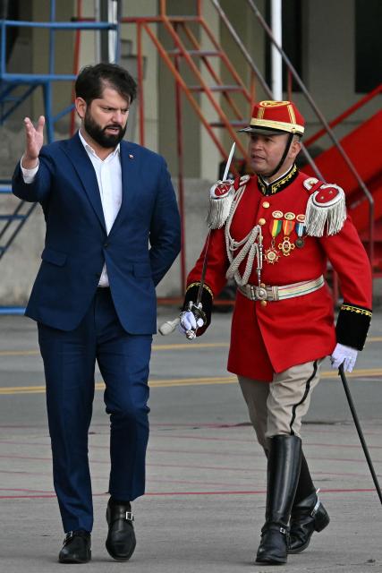 Chile's President Gabriel Boric arrives at El Alto International Airport in EL Alto, Bolivia on November 7, 2025, ahead of the inauguration of president-elect Rodrigo Paz, which will take place on November 8. (Photo by AIZAR RALDES / AFP)