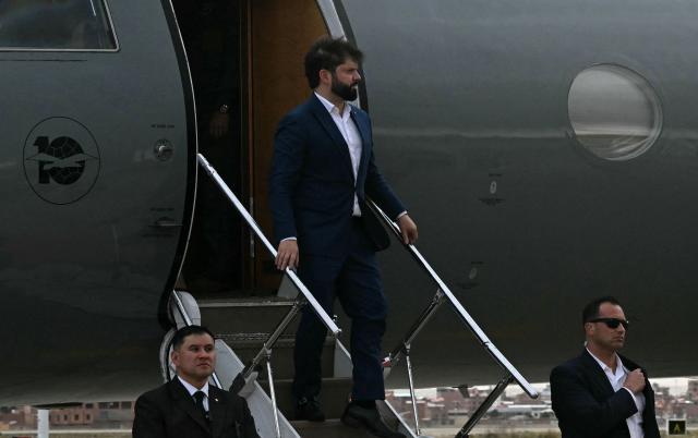Chile's President Gabriel Boric arrives at El Alto International Airport in EL Alto, Bolivia on November 7, 2025, ahead of the inauguration of president-elect Rodrigo Paz, which will take place on November 8. (Photo by AIZAR RALDES / AFP)
