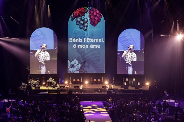 Believers attend the Congres Mission 2025 meeting at the Accor Arena Paris theatre in Paris, on November 7, 2025. (Photo by STEPHANE DE SAKUTIN / AFP)