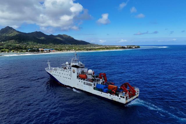 Chinese research vessel Da Yang Hao arrives at Avatiu Harbour in the Avarua district of the Cook Islands on November 8, 2025, as part of a mission to support research into potential deep-sea mining. A Chinese research vessel docked in the Cook Islands, as it probed the Pacific nation's deep-sea mining potential, a fledgling industry of mounting interest to both Beijing and Washington. (Photo by Johnny Beasley / AFP)