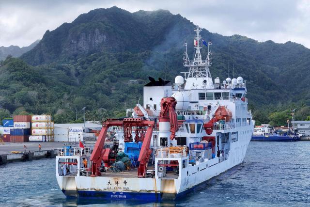 Chinese research vessel Da Yang Hao arrives at Avatiu Harbour in the Avarua district of the Cook Islands on November 8, 2025, as part of a mission to support research into potential deep-sea mining. A Chinese research vessel docked in the Cook Islands, as it probed the Pacific nation's deep-sea mining potential, a fledgling industry of mounting interest to both Beijing and Washington. (Photo by Johnny Beasley / AFP)