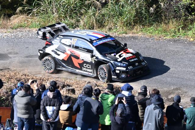 Sebastien Ogier and his co-driver Vincent Landais of France drive their Toyota GR Yaris Rally1 during the SS9 Ena section of the Rally Japan, the 13th round of FIA World Rally Championships, in Ena city, Gifu prefecture on November 8, 2025. (Photo by Toshifumi KITAMURA / AFP)