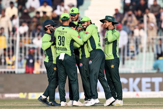 Pakistan's captain Shaheen Shah Afridi (C back) celebrates with teammates after taking a catch to dismiss South Africa's Tony de Zorzi during the third and final one-day international (ODI) cricket match between Pakistan and South Africa at the Iqbal Stadium in Faisalabad on November 8, 2025. (Photo by Aamir QURESHI / AFP)
