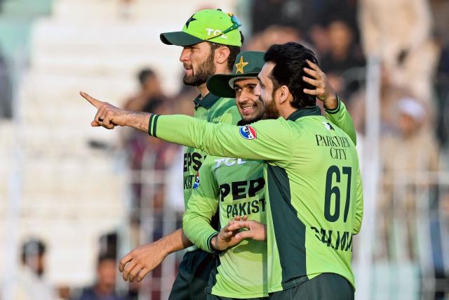 Pakistan's Salman Agha (R) celebrates with Saim Ayub (C) and captain Shaheen Shah Afridi after taking the wicket of South Africa's Tony de Zorzi during the third and final one-day international (ODI) cricket match between Pakistan and South Africa at the Iqbal Stadium in Faisalabad on November 8, 2025. (Photo by Aamir QURESHI / AFP)