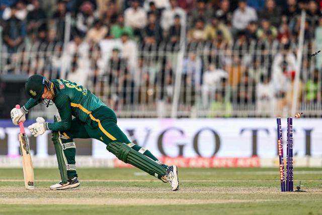 South Africa's Rubin Hermann is clean bowled by Pakistan's Abrar Ahmed during the third and final one-day international (ODI) cricket match between Pakistan and South Africa at the Iqbal Stadium in Faisalabad on November 8, 2025. (Photo by Aamir QURESHI / AFP)