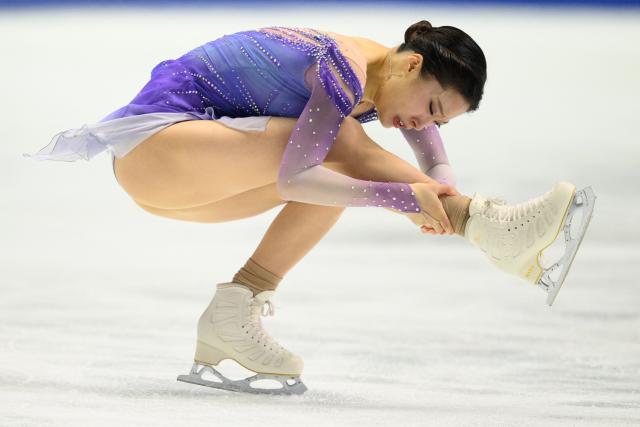 South Korea's You Young competes in the women's free skating during the NHK Trophy figure skating competition in Kadoma City, Osaka Prefecture on November 8, 2025. (Photo by Philip FONG / AFP)