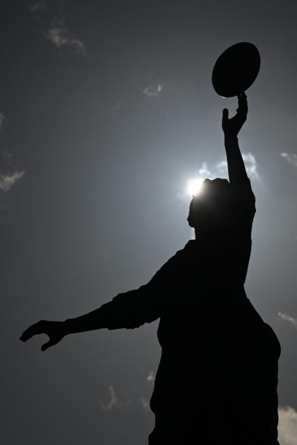 The bronze statue of a rugby line-out by British sculptor Gerald Laing is pictured outside the stadium ahead of the Autumn Nations Series international rugby union match between England and Fiji at Allianz Stadium, Twickenham, in south-west London, on November 8, 2025. (Photo by Glyn KIRK / AFP)