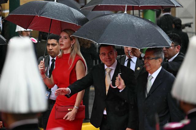 Ecuador's President Daniel Noboa (C) and his wife, First Lady Lavinia Valbonesi, arrive at the Murillo Square for the inauguration ceremony of Bolivia's president-elect Rodrigo Paz in La Paz on November 8, 2025. (Photo by AIZAR RALDES / AFP)