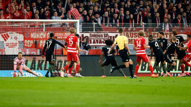 Union Berlin's Dutch defender #05 Danilho Doekhi (R) shoots and scores his team's first goal past Bayern Munich's German goalkeeper #01 Manuel Neuer (L) during the German first division Bundesliga football match between 1 FC Union Berlin and FC Bayern Munich in Berlin on November 8, 2025. (Photo by Odd ANDERSEN / AFP) / DFL REGULATIONS PROHIBIT ANY USE OF PHOTOGRAPHS AS IMAGE SEQUENCES AND/OR QUASI-VIDEO
