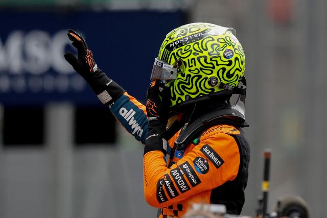 McLaren's British driver Lando Norris celebrates after winning the sprint of the Sao Paulo Formula One Grand Prix at the Jose Carlos Pace racetrack, aka Interlagos, in Sao Paulo, Brazil on November 8, 2025. (Photo by Miguel SCHINCARIOL / AFP)