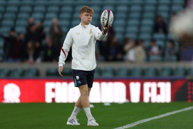 England's fly-half Fin Smith checks out the conditions ahead of the Autumn Nations Series international rugby union match between England and Fiji at Allianz Stadium, Twickenham, in south-west London, on November 8, 2025. (Photo by Adrian Dennis / AFP)