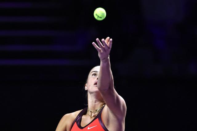 Belarus' Aryna Sabalenka serves to Kazakhstan's Elena Rybakina during the final of the Women's WTA Finals, in Riyadh on November 8, 2025. (Photo by Fayez NURELDINE / AFP)