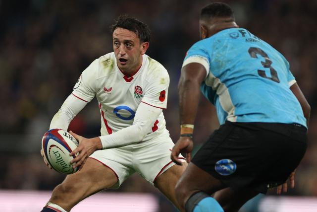 England's scrum-half Alex Mitchell looks to pass the ball during the Autumn Nations Series international rugby union match between England and Fiji at Allianz Stadium, Twickenham, in south-west London, on November 8, 2025. (Photo by Adrian Dennis / AFP)