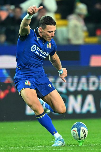 Italy's fly half #10 Paolo Garbisi kicks a penalty during the Autumn Nations Series international rugby union match between Italy and Australia (wallabies) at the Friuli stadium in Udine on November 8, 2025. (Photo by Stefano RELLANDINI / AFP)